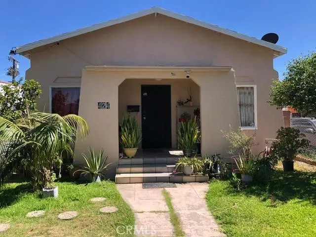Single Family Residence for sale at 424 E 91st Street, Los Angeles, CA featuring 4 beds and 2 baths