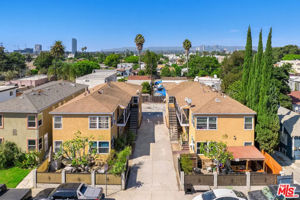 Residential Income for sale at 2743 S Redondo Boulevard, Los Angeles, CA featuring 6 beds and 4 baths