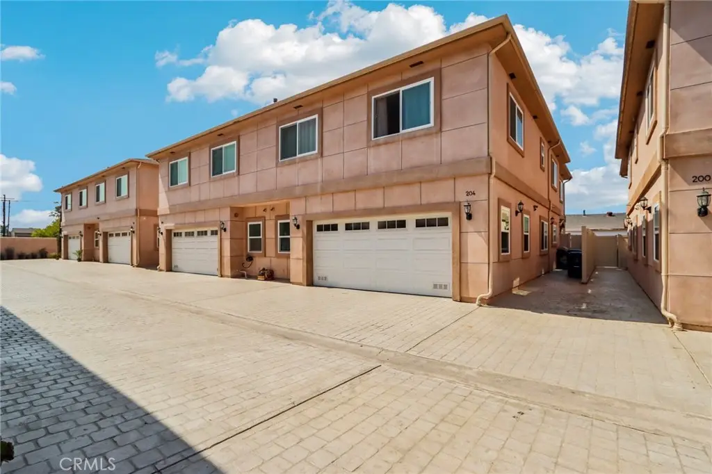 Townhouse for sale at 204 E 121st, Los Angeles, CA featuring 5 beds and 4 baths