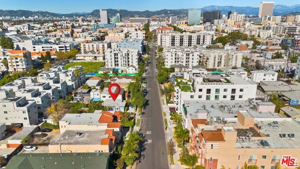 Single Family Residence for sale at 1121 S Serrano Avenue, Los Angeles, CA featuring 2 beds and 1 bath