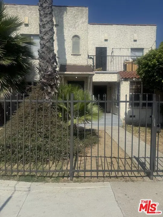 Residential Income for sale at 6125 West Boulevard, Los Angeles, CA featuring 6 beds and 4 baths