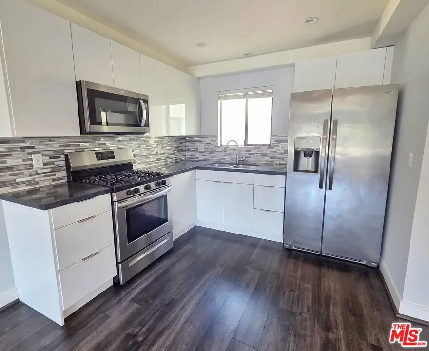 Residential Lease for rent at 2651 S Hobart Blvd 6, Los Angeles, Los Angeles County, CA featuring 4 beds and 3 baths