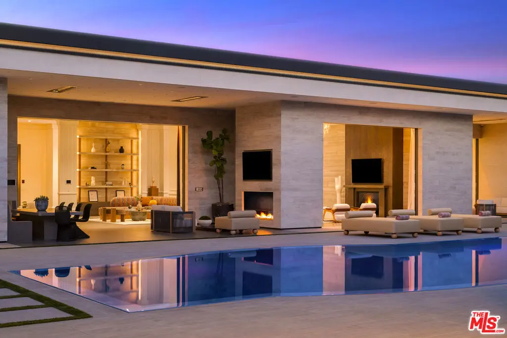 Single Family Residence for sale at 145 N Mapleton Drive, Los Angeles, CA featuring 7 beds and 14 baths