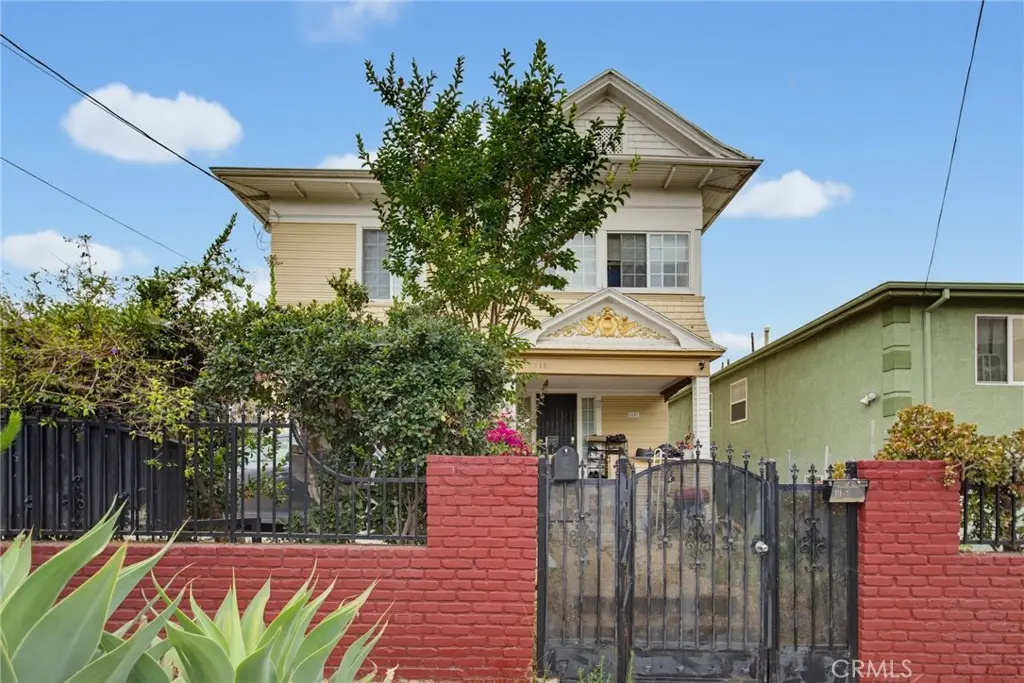 Single Family Residence for sale at 1107 S Mariposa Avenue, Los Angeles, CA featuring 8 beds and 5 baths