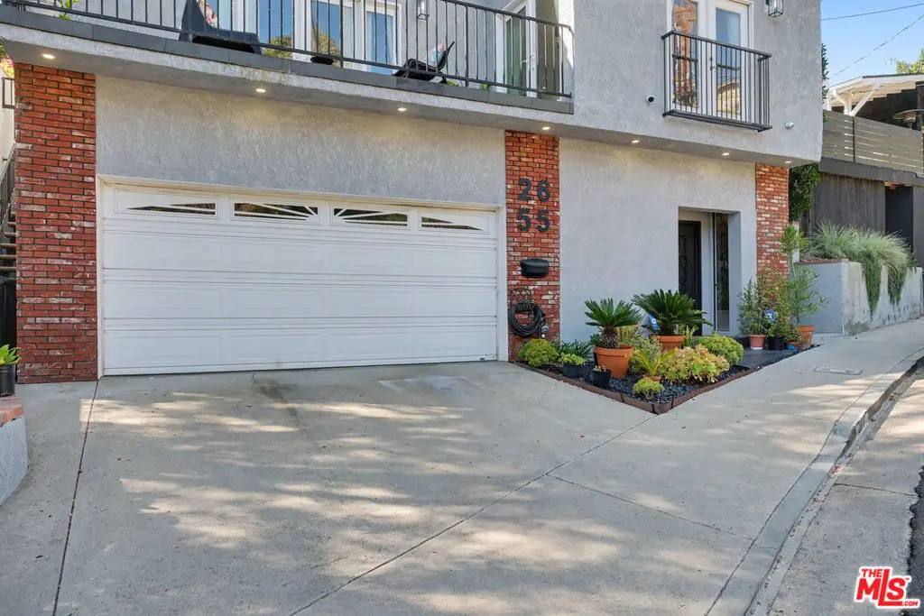 Single Family Residence for sale at 2655 Saxon Drive, Los Angeles, CA featuring 4 beds and 3 baths
