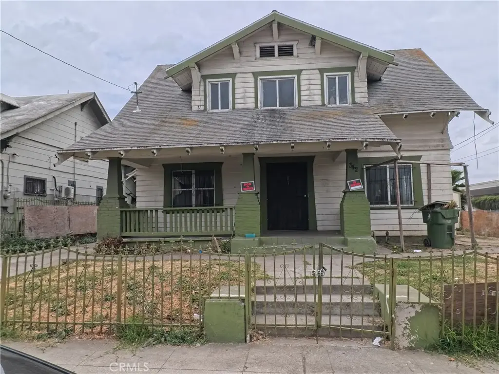 Duplex for sale at 342 W and 342 1/2 W. 52nd, Los Angeles, CA featuring 4 beds and 2 baths