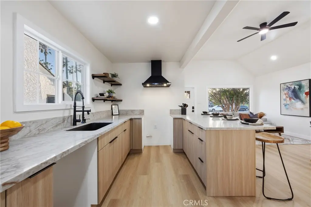 Single Family Residence for sale at 5612 S Rimpau, Los Angeles, CA featuring 3 beds and 2 baths