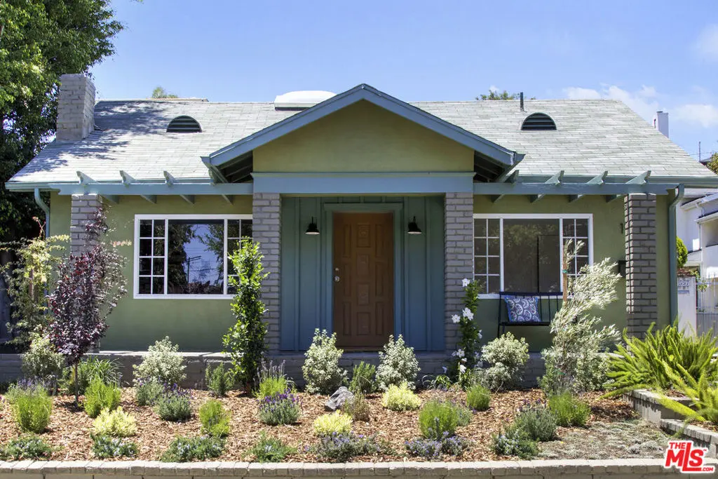 Single Family Residence for sale at 1561 Carmona Avenue, Los Angeles, CA featuring 4 beds and 3 baths