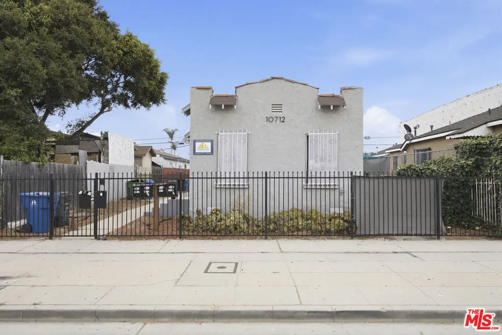 Residential Income for sale at 10712 S Broadway, Los Angeles, CA featuring 4 beds and 4 baths