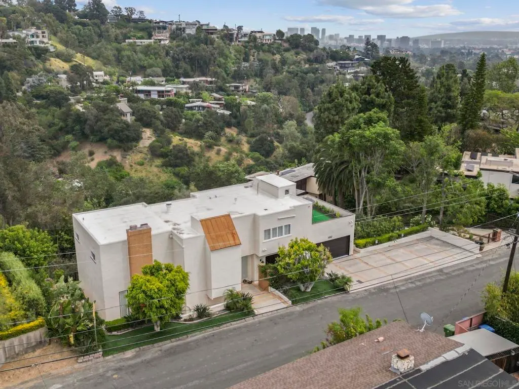 Single Family Residence for sale at 1052 N Kenter Ave, Los Angeles, CA featuring 4 beds and 5 baths