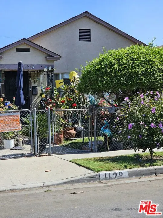 Residential Income for sale at 1129 E 71st Street, Los Angeles, CA featuring 5 beds and 3 baths