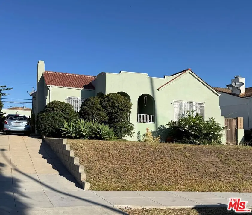Single Family Residence for sale at 1435 S Spaulding Avenue, Los Angeles, CA featuring 2 beds and 1 bath