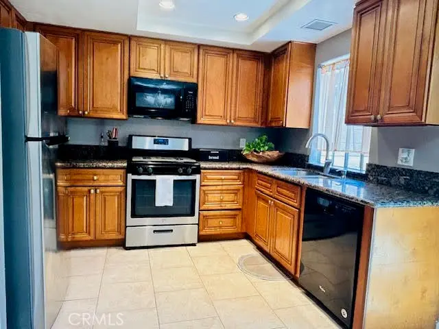 Condominium for sale at 7304 Exeter Street E, Paramount, CA featuring 2 beds and 2 baths