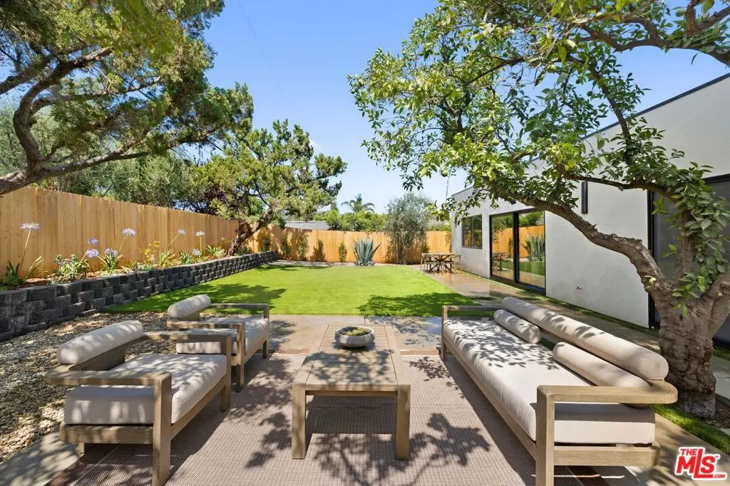 Single Family Residence for sale at 23861 Gilmore Street, Los Angeles, CA featuring 4 beds and 5 baths