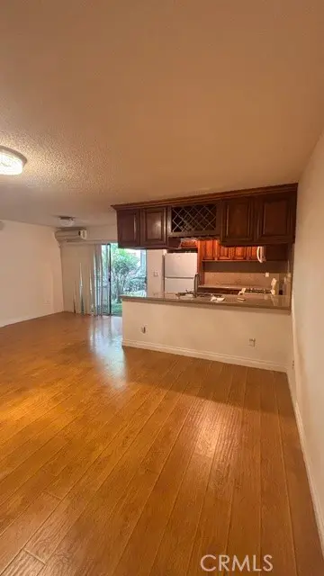 18530 Hatteras Street 102, Tarzana, CA — listing photo 1