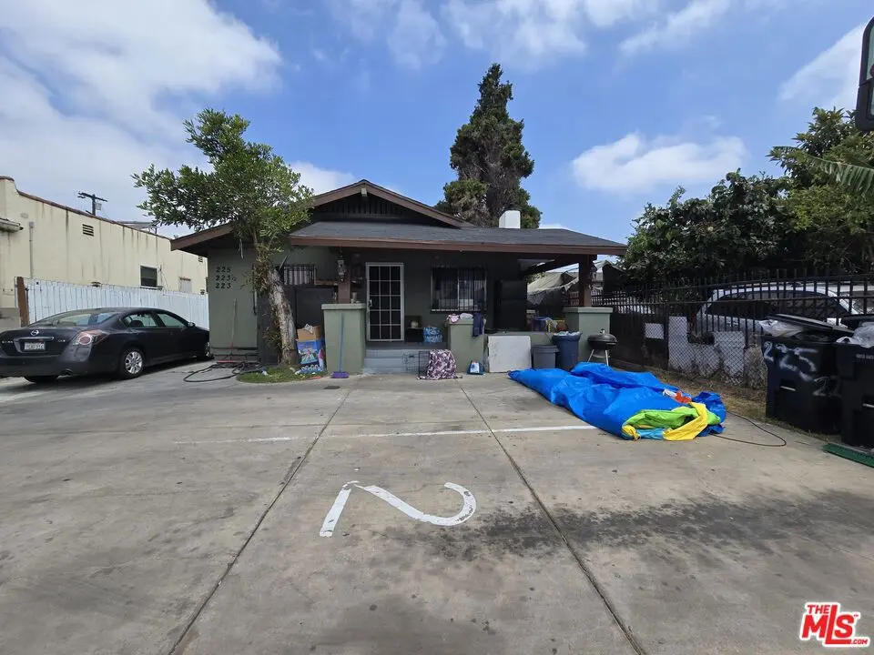 Residential Income for sale at 223 E 74th Street, Los Angeles, CA featuring 5 beds and 4 baths
