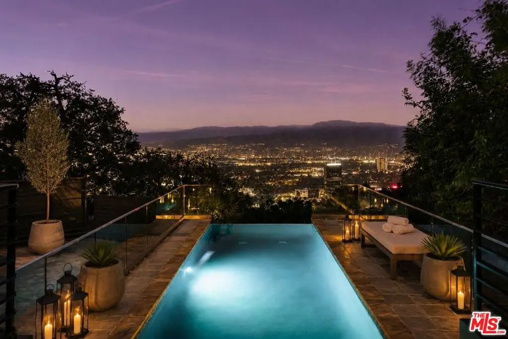 Single Family Residence for sale at 7825 Torreyson Drive, Los Angeles, CA featuring 4 beds and 4 baths