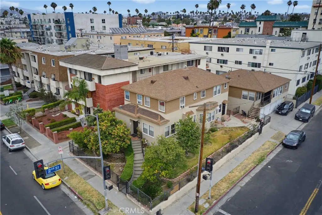 Quadruplex for sale at 148 S Normandie Avenue, Los Angeles, CA featuring 7 beds and 6 baths