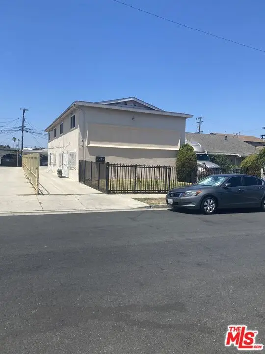 Residential Income for sale at 1215 W 102nd Street, Los Angeles, CA featuring 8 beds and 8 baths