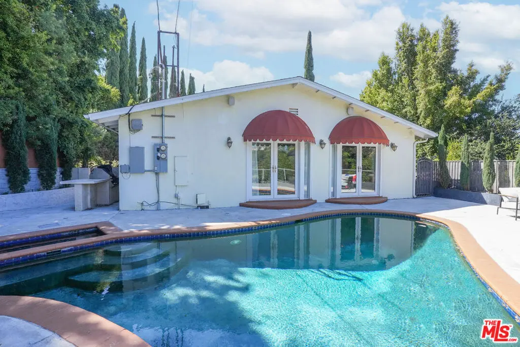 Single Family Residence for sale at 7796 Skyhill Drive, Los Angeles, CA featuring 5 beds and 4 baths
