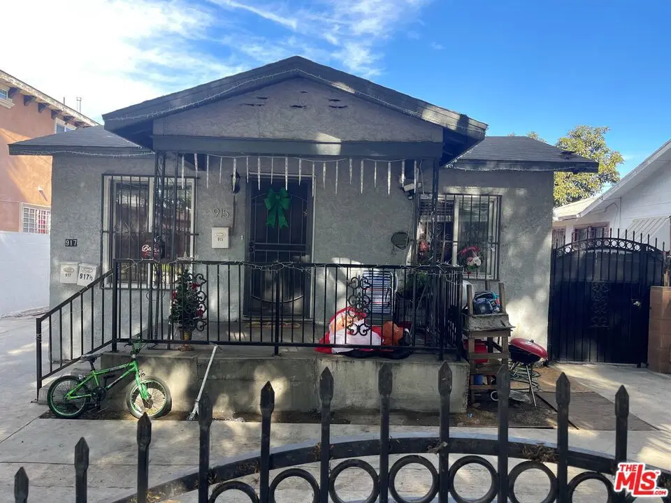 Single Family Residence for sale at 915 E 76th Place, Los Angeles, CA featuring 5 beds and 3 baths