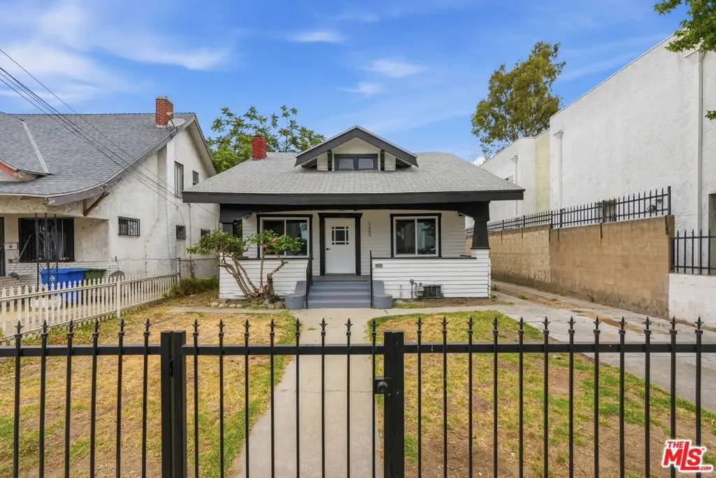 Single Family Residence for sale at 1009 E 43rd Street, Los Angeles, CA featuring 2 beds and 2 baths