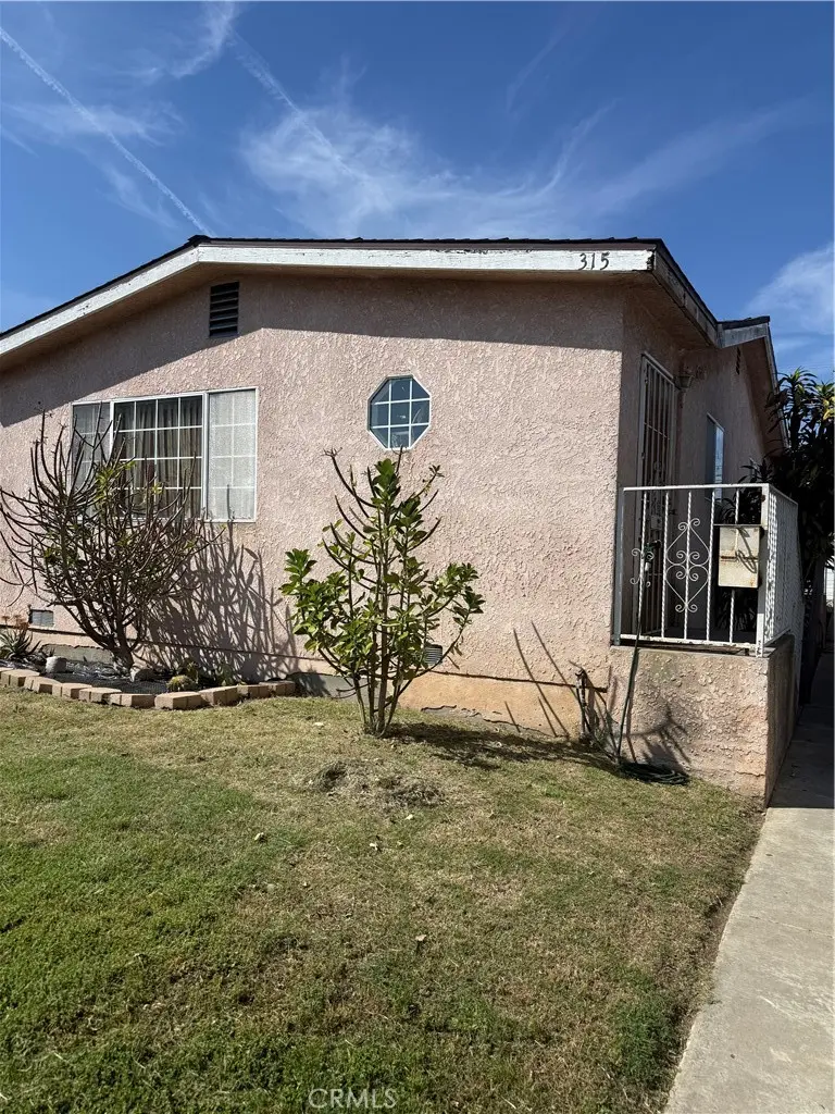 Single Family Residence for sale at 315 W 118th, Los Angeles, CA featuring 2 beds and 2 baths