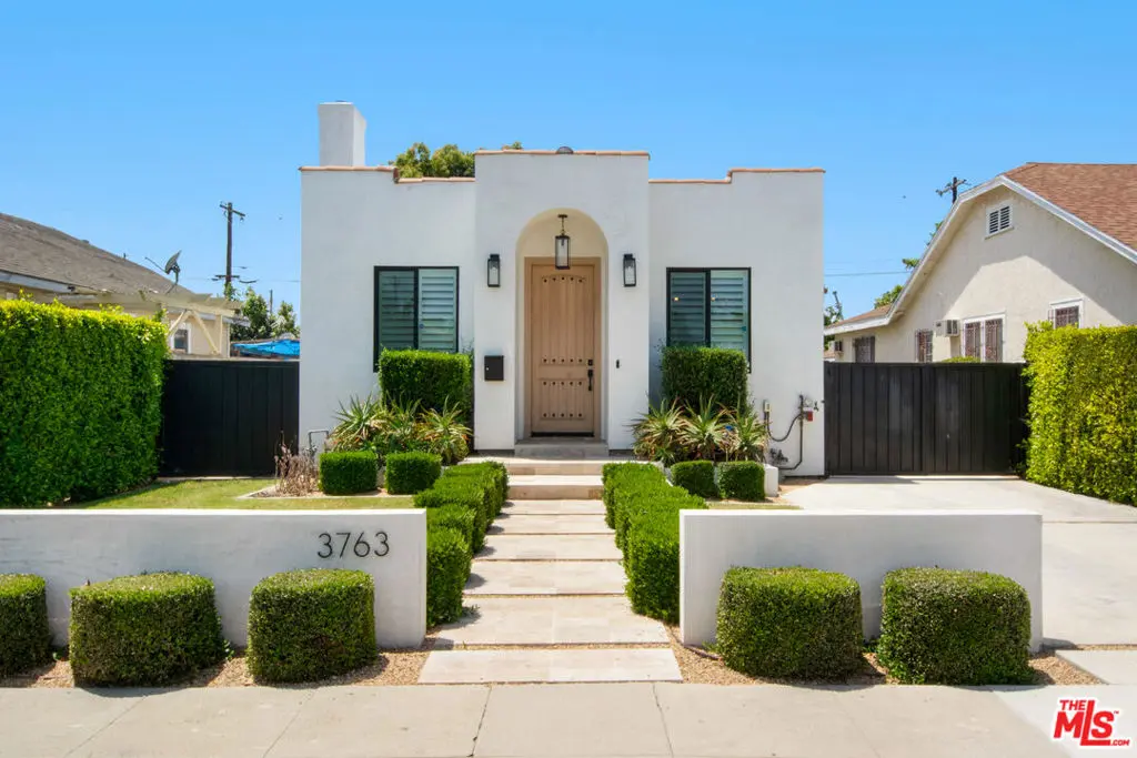 Single Family Residence for sale at 3763 S Gramercy Place, Los Angeles, CA featuring 4 beds and 3 baths