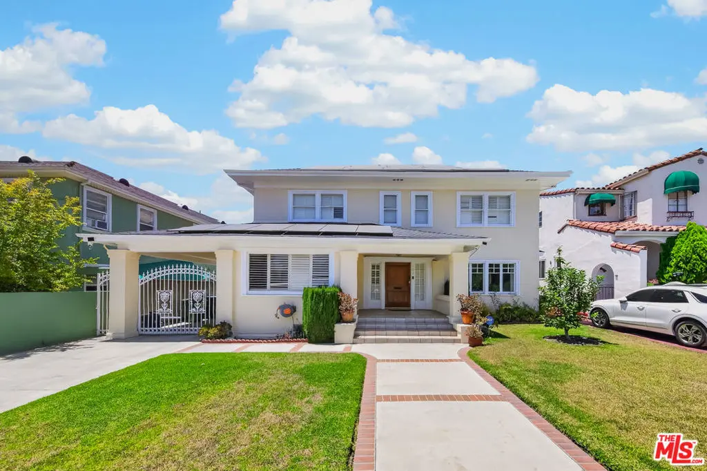 Single Family Residence for sale at 1057 S Gramercy Place, Los Angeles, CA featuring 5 beds and 3 baths