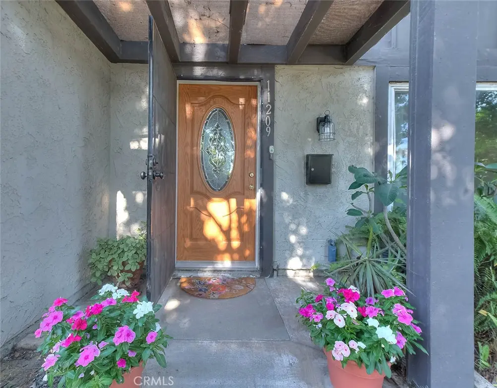 Townhouse for sale at 11209 Lambert, Stanton, CA featuring 3 beds and 2 baths