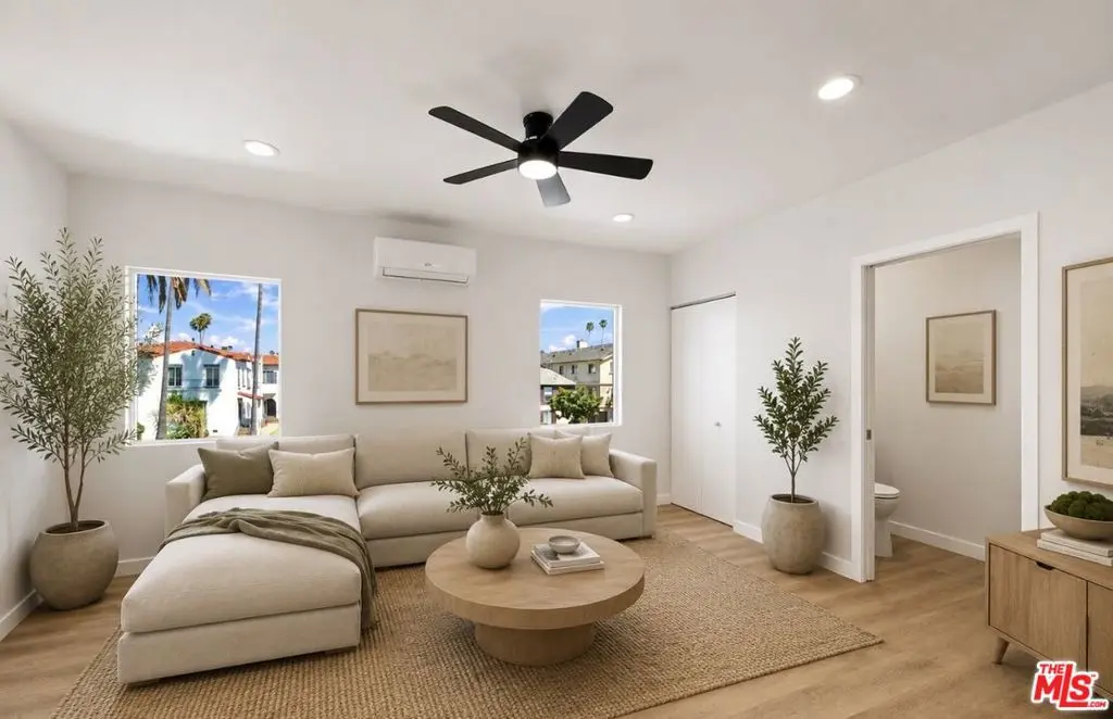 Condominium for sale at 1189 1/2 Crenshaw Boulevard, Los Angeles, CA featuring 2 beds and 2 baths