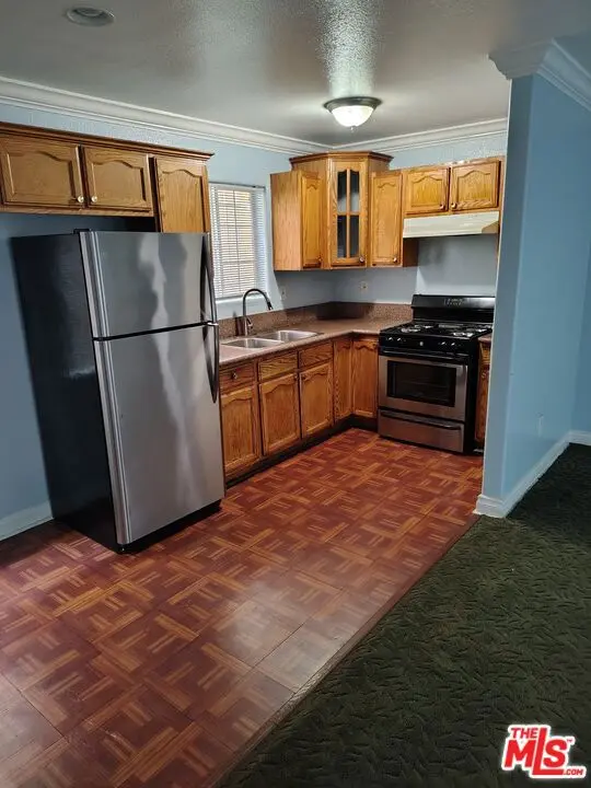 Residential Lease for rent at 10516 Avalon Boulevard, Los Angeles, Los Angeles County, CA featuring 3 beds and 2 baths