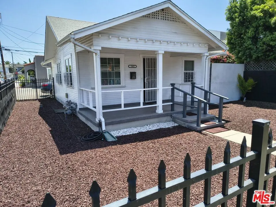 Residential Income for sale at 2402 Carmona Avenue, Los Angeles, CA featuring 4 beds and 3 baths