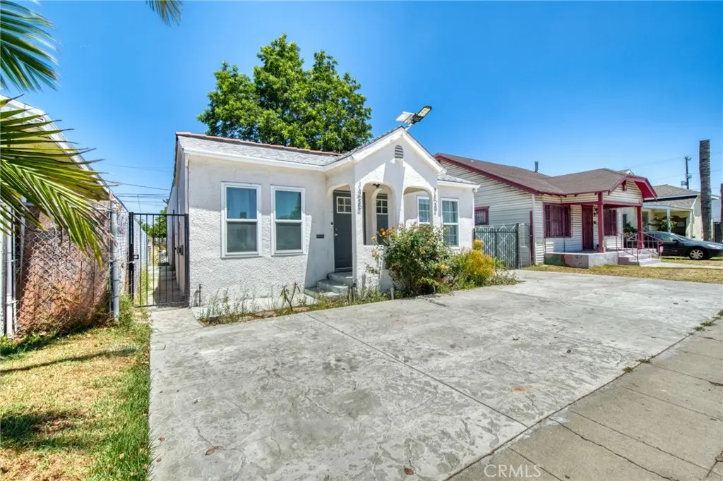 Duplex for sale at 1423 W 65th, Los Angeles, CA