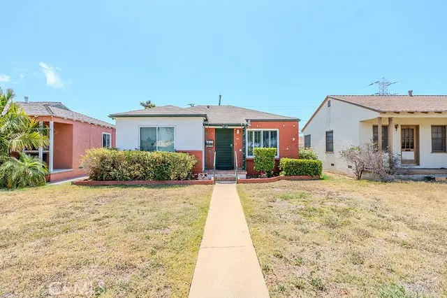 Single Family Residence for sale at 714 E 135th, Los Angeles, CA featuring 4 beds and 2 baths