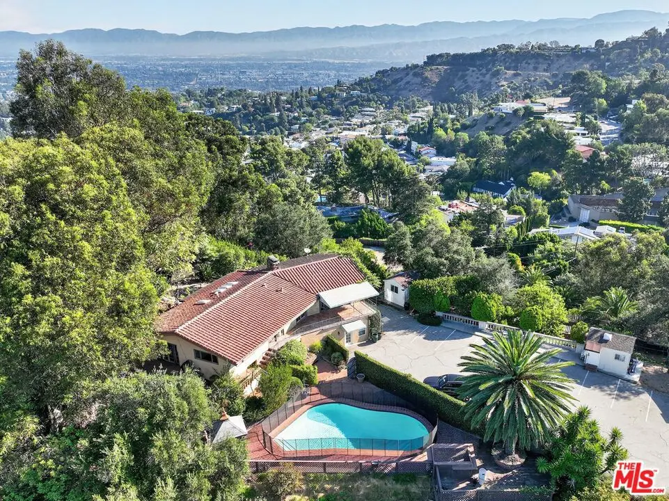 Single Family Residence for sale at 8207 Mulholland Drive, Los Angeles, CA featuring 10 beds and 7 baths