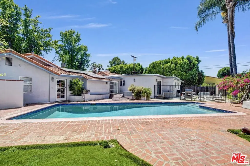 Single Family Residence for sale at 5195 Densmore Avenue, Los Angeles, CA featuring 4 beds and 3 baths