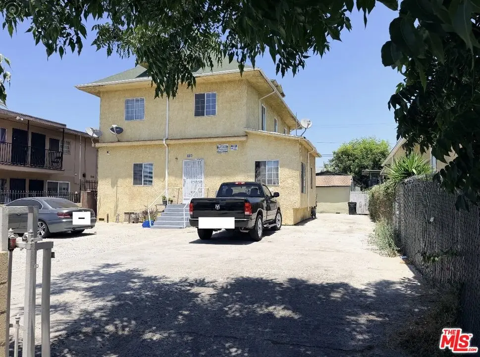 Residential Income for sale at 823 E Adams Boulevard, Los Angeles, CA featuring 7 beds and 3 baths
