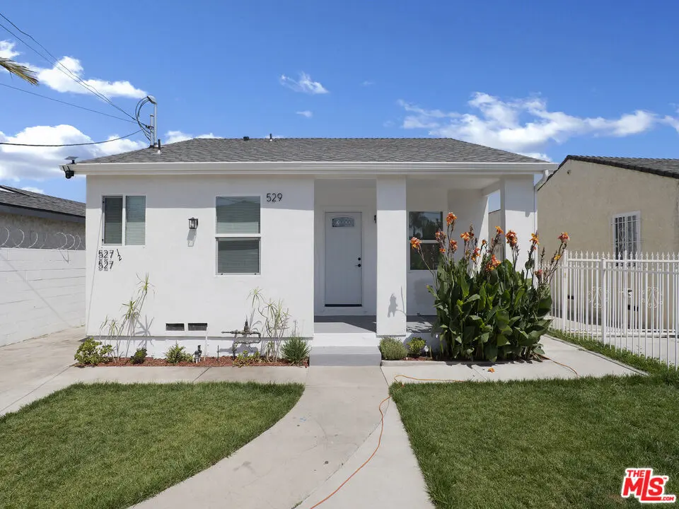Residential Income for sale at 529 W 90th Street, Los Angeles, CA featuring 7 beds and 5 baths