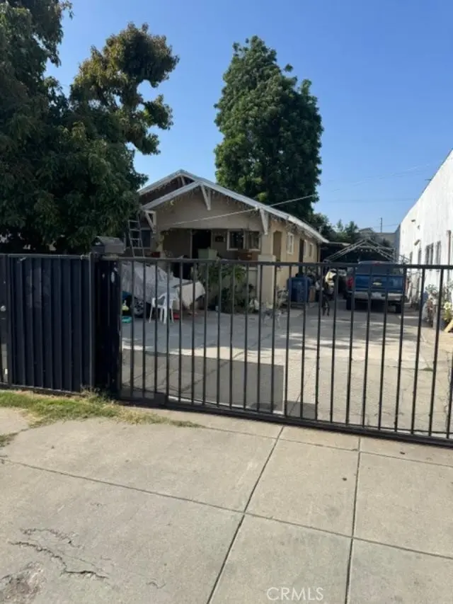 Single Family Residence for sale at 1655 E 42nd Street, Los Angeles, CA featuring 2 beds and 1 bath