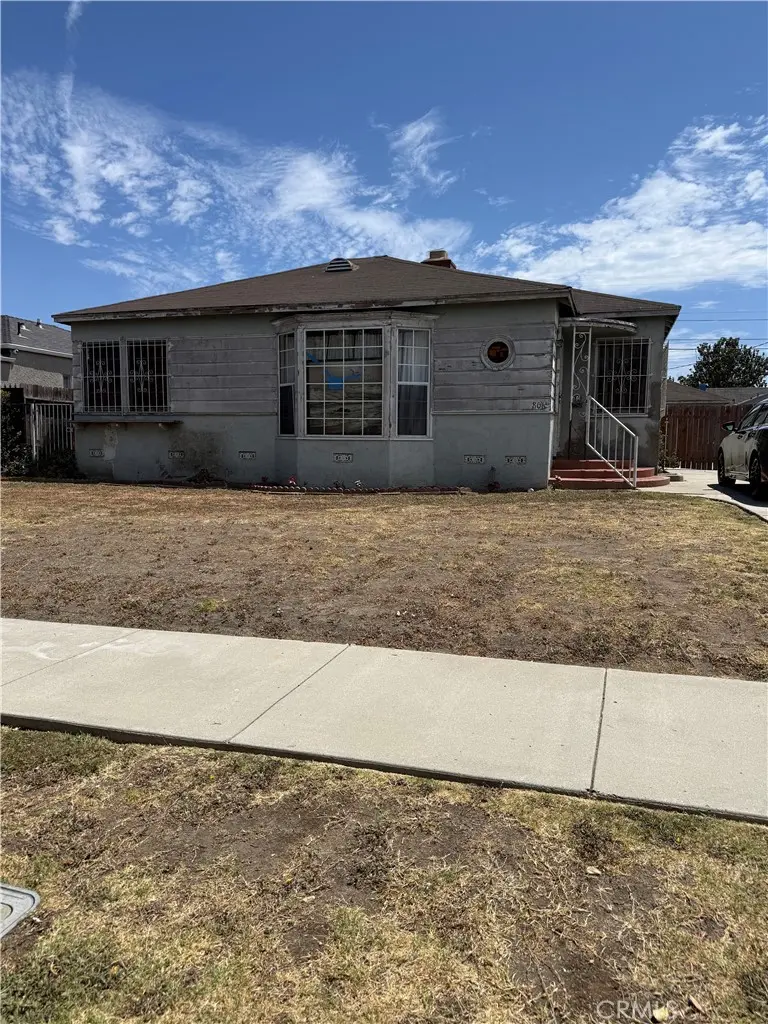 Duplex for sale at 806 W 108th, Los Angeles, CA featuring 2 beds and 3 baths