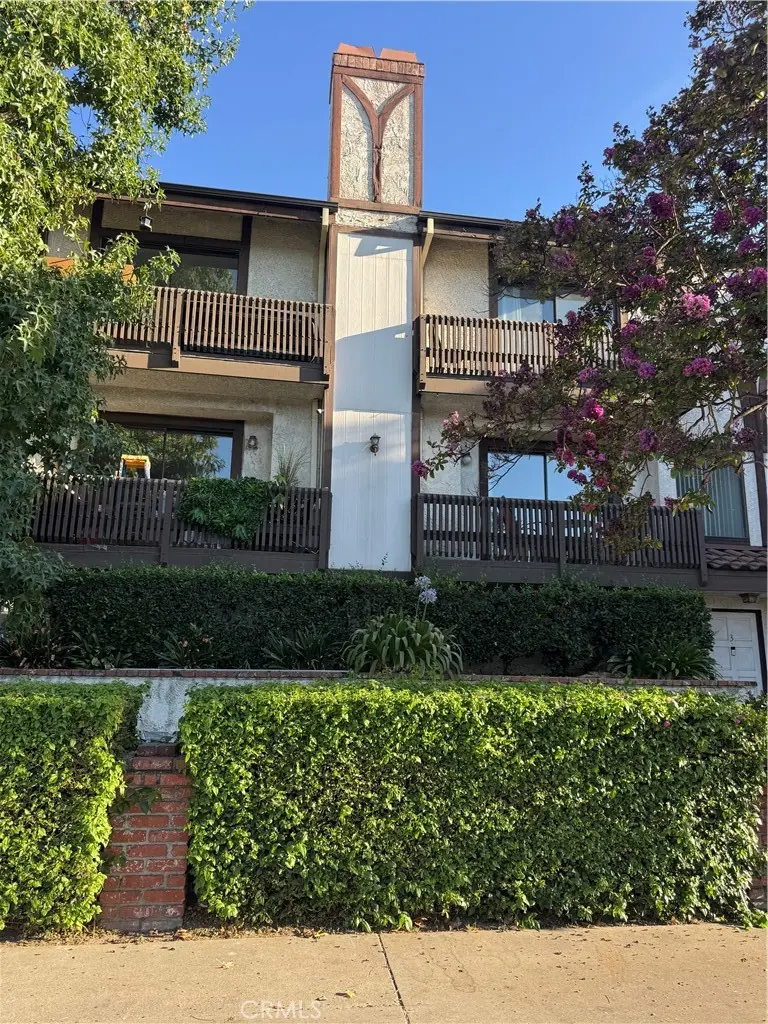 Townhouse for sale at 11542 Burbank Boulevard 8, Los Angeles, CA featuring 2 beds and 3 baths