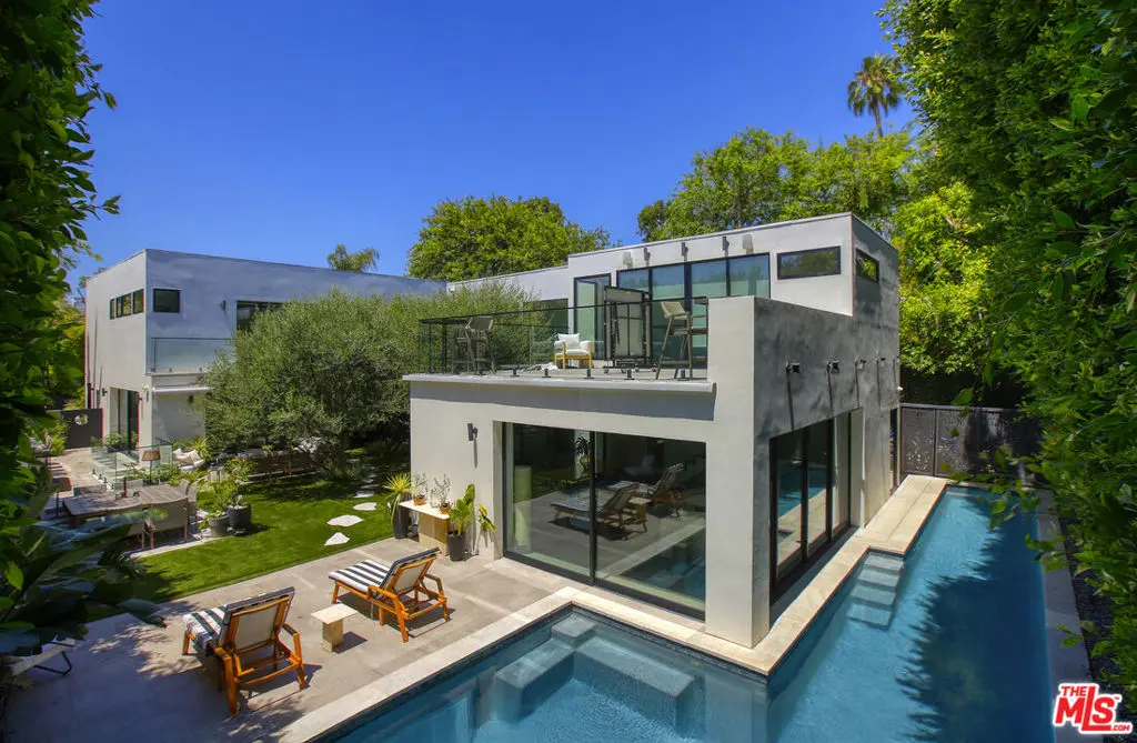 Single Family Residence for sale at 810 N Orlando Avenue, Los Angeles, CA featuring 6 beds and 9 baths