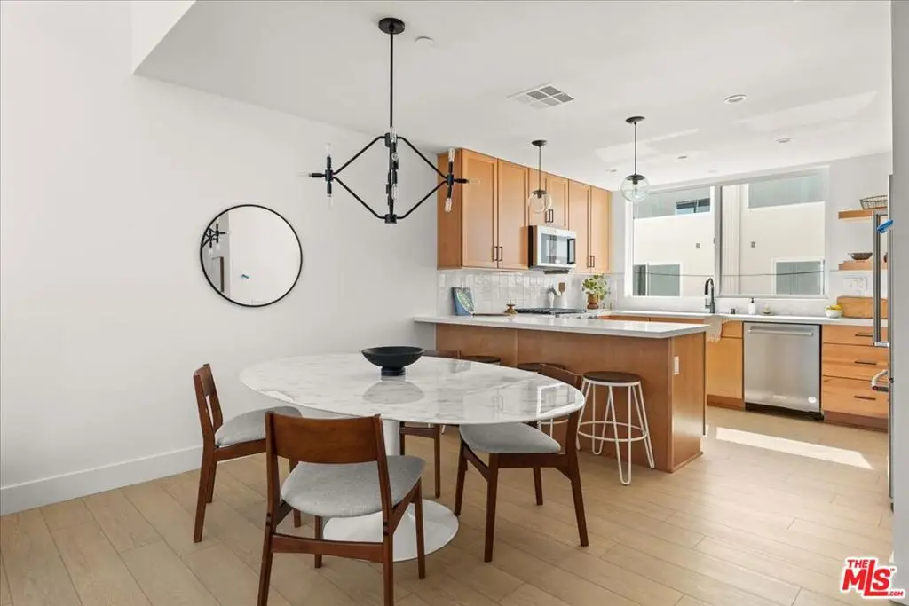 Townhouse for sale at 11212 W Victory Boulevard 7, Los Angeles, CA featuring 3 beds and 4 baths