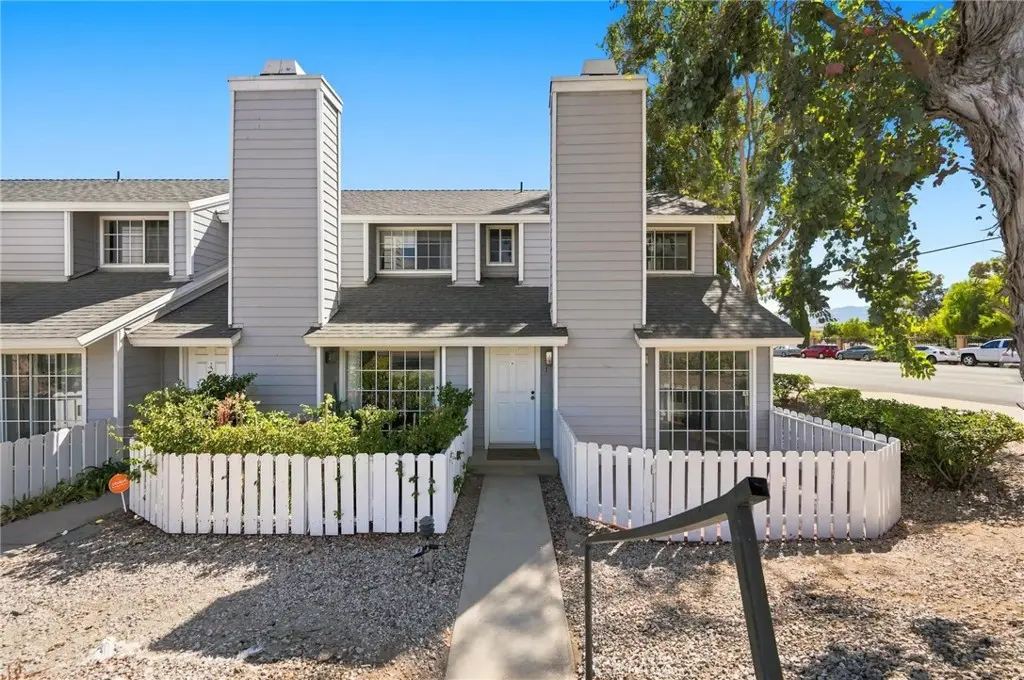 Townhouse for sale at 14380 Foothill Blvd 1, Los Angeles, CA featuring 2 beds and 3 baths