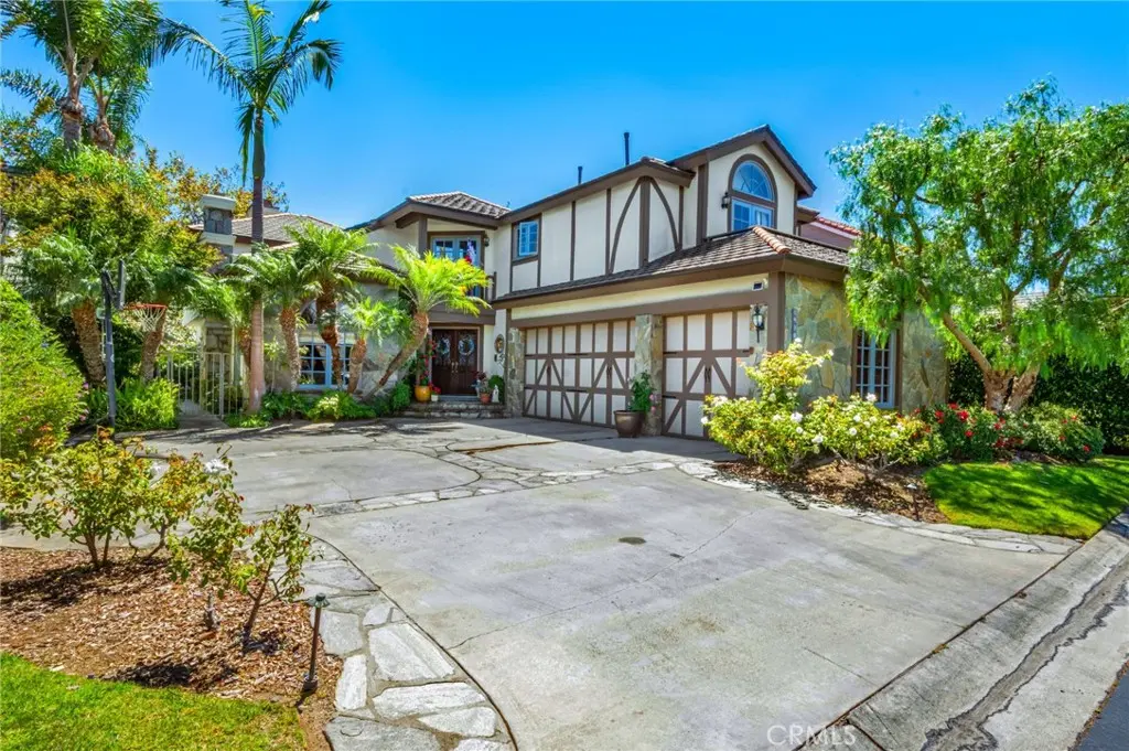 Single Family Residence for sale at 19381 Woodlands Dr, Huntington Beach, CA featuring 4 beds and 4 baths