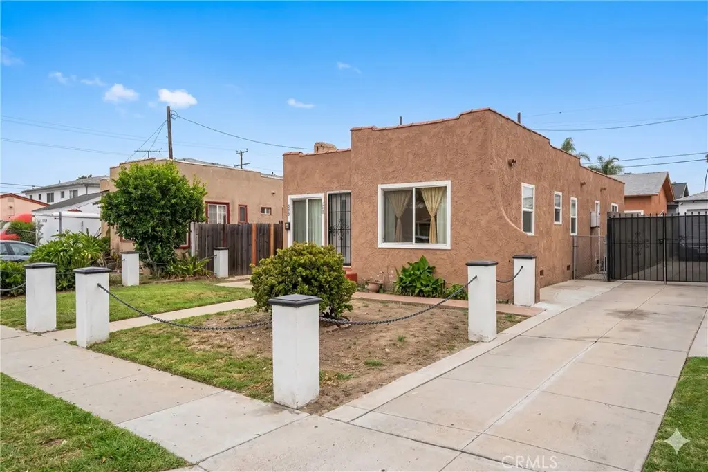 Duplex for sale at 514 W 105th, Los Angeles, CA featuring 3 beds and 2 baths