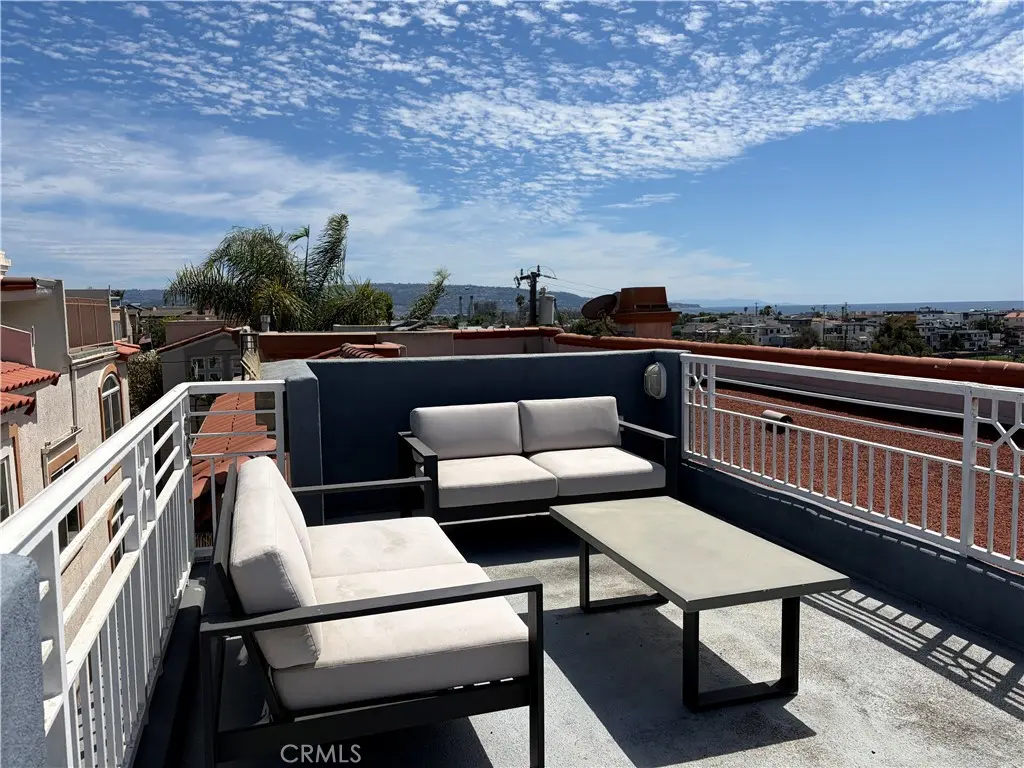 Townhouse for sale at 703 11th Street, Hermosa Beach, CA featuring 4 beds and 4 baths