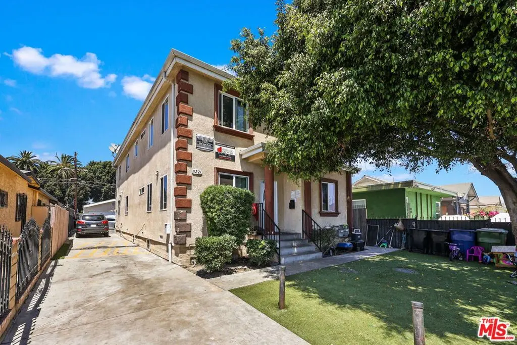 Residential Income for sale at 1219 E 57th Street, Los Angeles, CA featuring 8 beds and 4 baths