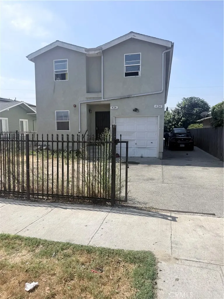 Duplex for sale at 426 E 59th, Los Angeles, CA featuring 8 beds and 5 baths